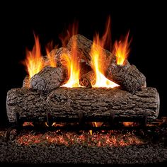 an image of a fire burning in the fireplace with flames coming from it's logs