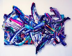 an abstract piece of art that looks like it has been made out of strips of paper