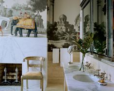 a bathroom with two sinks and an elephant wall mural on the wall next to it