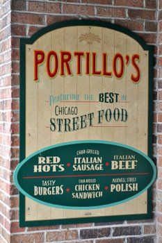 a sign on the side of a brick building that says portland's best street food