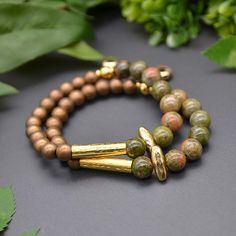 Let mother nature engulf you with warmth and golden light with our new Nature Goddess bracelet. Stand out from the norm with this stunning bracelet that feature earthy unakite gemstones, bronze colored hematite, and striking, goddess-like gold accents. Step into your inner Goddess mode everyday, all day with our new Nature Goddess bracelet. This bracelet is a limited run design so snag one today! Experience a little bit of nature with every Emerald Sun Creations! Buying this as a gift? Tell us w Goddess Bracelet, Nature Goddess, Bracelet Stand, Bracelet Size Chart, Inner Goddess, Writing Gifts, Golden Light, Limited Run, Golden Lights