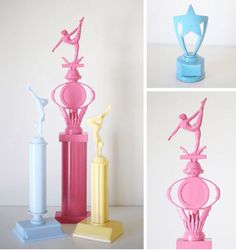 three different colored vases with statues on them and one in the shape of a ballerina