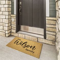 a door mat that says, my wilson family on it in front of a house