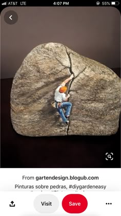 an image of a person climbing on a rock