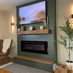 a fireplace with a flat screen tv above it