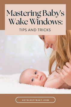 a woman holding a baby in her lap with the words mastering baby's wake windows tips and tricks