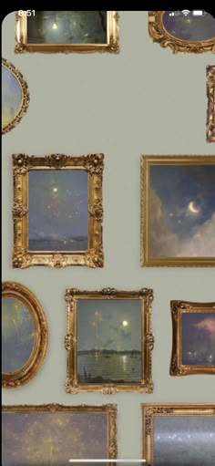 there are many paintings on the wall