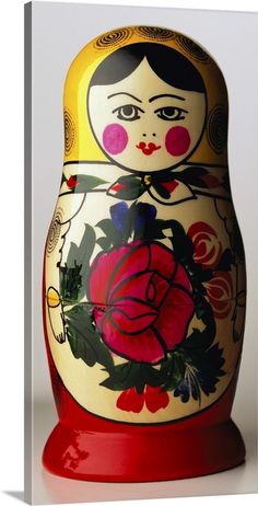 an image of a russian nesting doll with flowers on it's body and face