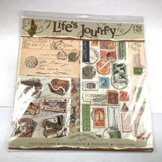 an assortment of stamps and stickers on a white surface with the words life's journey