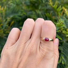 "Vintage 14kt yellow gold ruby ring size 6. This vintage ring features an oval Cabochon ruby.  Ruby is the birthstone for July. The Stone is approx. .20tcw the stone does move a little in the mounting. All of our rings are sent in a beautiful ring box and are unpolished unless otherwise requested.   As a third generation jeweler, my passion for vintage, antique and estate jewelry is why Timeless Estate Jewelry exists. I love seeing jewelry lovers cherish these timeless pieces and give them another chapter in time with a new every day expression. Each piece is unique, one of a kind and crafted with designs that have stood the test of generations, proving that it is \"Timeless\".  See more of my vintage jewelry in my shop https://www.etsy.com/shop/TimelessEstJewelry?ref=seller-platform-mcnav Ruby Cabochon Ring, Antique Ruby Ring, Cabochon Ruby, Estate Ring, Ruby Ring Gold, Estate Rings, Antique Ring, Ladies Ring, Ring Ideas