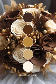 a bridal bouquet with brown, white and gold flowers on it's side