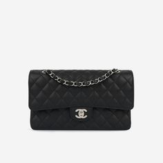 For timeless Parisian-chic there is no better investment than a Chanel classic flap bag. Created in black caviar leather in the coveted Medium size remains the all-time best-seller at bagsalora. This Chanel comes with all the iconic features including multiple compartments and pockets. The interwoven chain sits elegantly on your shoulder or doubled up on your arm. SPL Exterior Black caviar leather Silver hardware CC Twistlock closure Slip pocket at rear of bag 30 series - 2020 production Unused Interior Black lambskin lining Double flap Zip compartment on first flap Two slip pockets at interior wall Unused Sold with box, dust bag, card and redacted receipt SPL Height 16cm Width 26cm Depth 7cm Luxury Black Square Flap Bag, Luxury High-end Black Flap Bag, Chanel Classic Flap Bag Caviar, Black Chanel Flap Bag, Caviar Chanel Bag, Chanel Classic Flap Bag, Classic Flap Bag, Black Caviar, Leather Silver