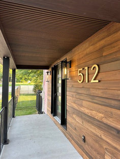 the number 512 is on the wall next to the front door and entry way