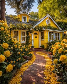 a yellow house surrounded by flowers and trees