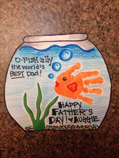 a fish in a bowl with the words happy father's day written on it