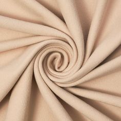 a close up view of a beige fabric