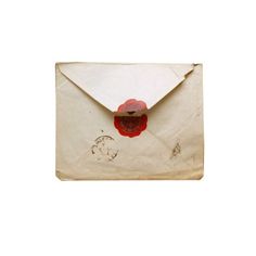 an old envelope with a red wax stamp on it