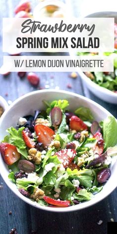 a salad in a bowl with strawberries and other vegetables on the side, along with text that reads strawberry spring mix salad w / lemon dijon vinaignette