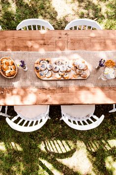 an overhead view of a picnic table with food on it