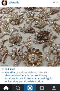 an image of some gold brooches and pearls