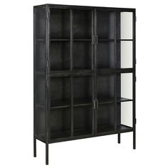 a black bookcase with glass doors on the front and bottom shelves, against a white background