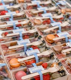 many plastic containers filled with different types of food