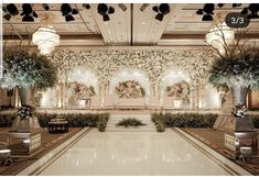 an elaborately decorated hall with flowers and greenery