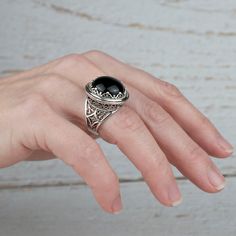 Black Onyx 925 Sterling Silver Ring Artisan Made Handcrafted Filigree Art Dome Ring Gift for Her Ring Face Length is 0.80 inches and Width is 0.80 inches Black Onyx Gemstone is 16 mm round cabochon cut. This metal embroidery filigree ring is oxidized and highly polished. Comes with velvet pouch and luxurious gift box. Filigree is made of delicate metal strands that have been skillfully fashioned to create an outstanding combination of old and modern art. Originating in Mesopotamia, Anatolia. It Gothic Silver Filigree Ring For Gifts, Black Sterling Silver Filigree Ring As A Gift, Ornate Black Sterling Silver Rings, Ornate Black Rings As Gift, Ornate Black Rings For Gifts, Ornate Black Rings For Gift, Black Ring With Intricate Design, Ornate Black Oval Ring, Black Intricate Design Jewelry As Gift