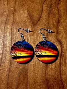 Picture I took of the sunset over the lake and made into 1" round  earrings.  Picture is on both sides. Sunset Over Lake, Round Earrings, The Sunset, Favorite Jewelry, Jewelry Earrings Dangle, Etsy Earrings, Beauty Book, Dangle Drop Earrings, Dangle Earrings