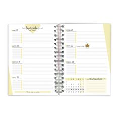 a spiral bound planner with yellow pages and numbers on the page is open to show it's contents