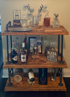 a wooden shelf with bottles and glasses on it