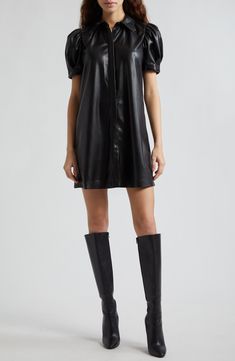 Make a bold, modern statement in this mini-length shirtdress made from sleek faux leather. 33 1/2" length (size Medium) Hidden-button placket Point collar Short sleeves 100% polyester with polyurethane coating Dry clean Imported Leather Dress And Boots, Shift Dress Outfit, Leather Dress Outfit, Couture Runway, Leather Dress, Alice Olivia, Shift Dress, Luxury Branding, Sleek