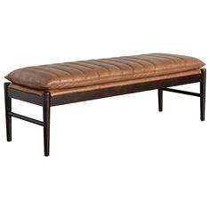 a brown leather bench sitting on top of a wooden frame