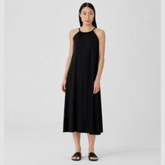 Elegant and easy. A halter dress with front shirring and a keyhole back. In our sustainable Fine Jersey. Silk Georgette Dress, Scoop Neck Midi Dress, Silk Tunic Dress, Eileen Fisher Dress, Basic Black Dress, Halter Style Dress, Blue Long Sleeve Dress, Easy A, Womens Shift Dresses