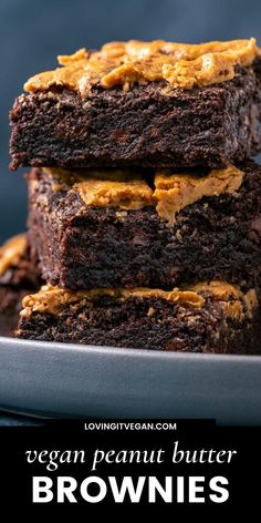 vegan peanut butter brownies stacked on top of each other