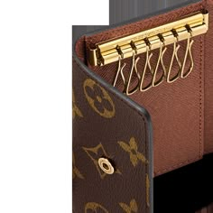 LOUIS VUITTON® - 6 Key Holder - Armagnac Designer Key Holder, Real Louis Vuitton, Louis Vuitton Key Holder, Louis Vuitton Official Website, Brass Hooks, Brass Hook, Louis Vuitton Official, Golden Color, Small Leather Goods