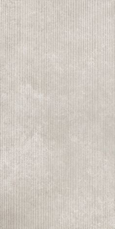 an image of a white textured wallpaper with vertical lines on the bottom and sides