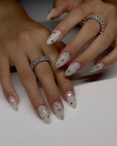 Star Nail Designs Simple, Nail Art Designs New Years, Short Almond Nails With Rhinestones, Studded Nail Art, Silver Celestial Nails, 2024 Almond Nails, Almond Bday Nails, Nails With Small Gems, Divine Feminine Nails