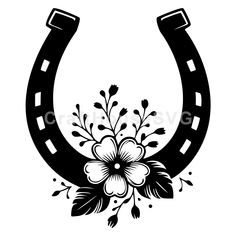 a black and white drawing of a horseshoe with flowers