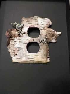 a piece of wood with holes in it