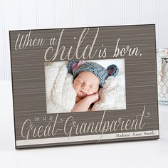 a wooden frame with a baby's photo and the words, when a child is born