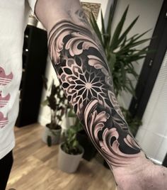 a person with a tattoo on their arm