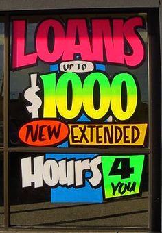 a store front window that has signs on the glass saying it's $ 4, 000