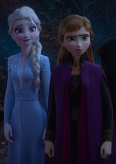 three frozen princesses standing next to each other