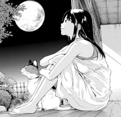 a woman sitting on the ground next to a dog under a full moon with trees in the background