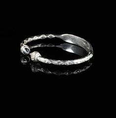 Material: .925 Sterling SilverThickness: .180" -------->About this bangle<---------This is a unique combination of the traditional West Indian Bangle with an Identification plate. The silver wire is marked with the pattern and then the plate is hammered from the middle and shaped by hand. This is a unique feature because the plate is never separate from the bangle and is less likely to break apart than some other bangles that have their plates soldered on. It does take more time and work than to Spiritual Silver Bangle For Anniversary, Sterling Silver Engraved Bangle For Anniversary, Adjustable Stackable Sterling Silver Bracelet For Anniversary, Adjustable Etched Sterling Silver Bracelet For Anniversary, Ceremonial Sterling Silver Round Bracelets, Sterling Silver Etched Bangle Bracelet, Adjustable Sterling Silver Bangle For Ceremonial Occasion, Sterling Silver Stackable Bangle For Anniversary, Traditional Engraved Sterling Silver Bracelet For Anniversary