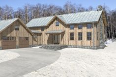 this is an artist's rendering of a house in the snow with two garages