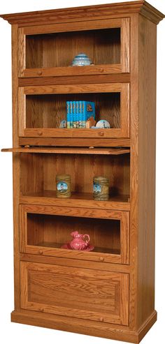 a wooden book shelf with three drawers