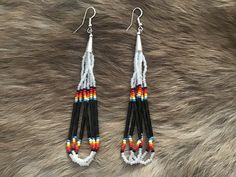 Authentic Beautiful Native American Indian Jewelry Navajo Hand Beaded Long Dangle Earrings. Great for a gift❤️ Handcrafted by Navajo Artist H. Crosby These beautiful earrings are 4.5" in length and 1" in width. Beaded Western Jewelry, Indian Jewelry Earrings, Bone Earrings, American Indian Jewelry, Beading Jewelery, Loop Earrings, Native American Beadwork, Indian Earrings, Southwestern Jewelry