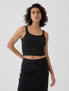 Soft, stretch cotton-modal blend cropped tank.  Round neck.  Tank straps.  Certain styles have allover prints.  * Fit: Stretch-to-Fit.  Slim & stretchy that forms to your shape.  Cropped, hits at the waist.  Models wearing Gap Black Crop Top Tank, Cropped Tank Top, Crop Tank, New Woman, Stretch Cotton, Baby Toddler, Gap, Round Neck